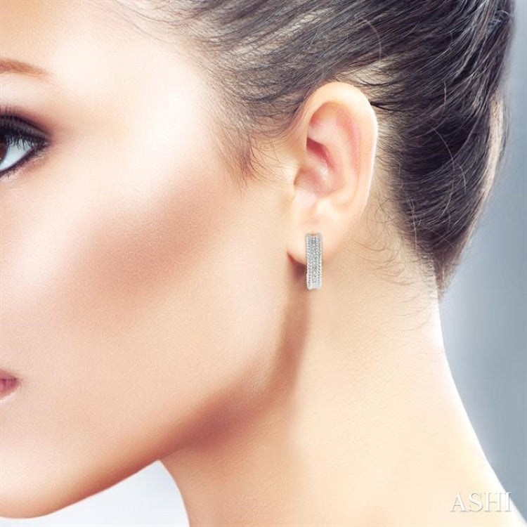 1/20 Ctw Round Cut Diamond Fashion Earrings in Sterling Silver
