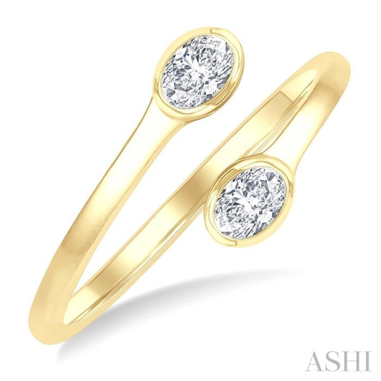 1/5 Ctw Split Single Coil Bezel Set Oval Cut Diamond Open Fashion Ring in 14K Yellow Gold