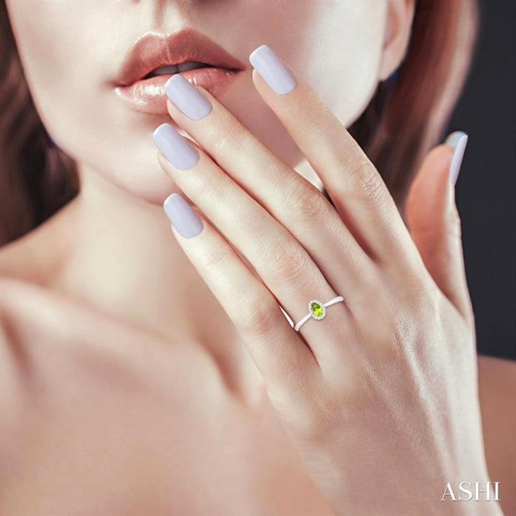 5x3 MM Oval Shape Peridot and 1/20 Ctw Round Cut Diamond Halo Semi-Precious Ring in 10K White Gold