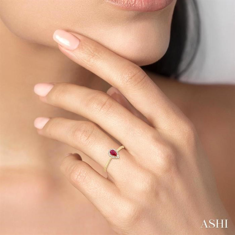5x3 MM Pear Shape Ruby and 1/20 Ctw Round Cut Diamond Halo Precious Ring in 10K Yellow Gold