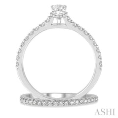 5/8 Ctw Round Cut Diamond Wedding Set With 1/2 Ct Pear Cut 1/4 Ct Center Stone Engagement Ring and 1/6 Ct Wedding Band in 14K White Gold