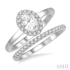 3/8 Ctw Round Cut Diamond Wedding Set With 1/3 Ct Halo 1/4 Ct Oval Cut Center Stone Engagement Ring and 1/10 Ct Wedding Band in 14K White Gold