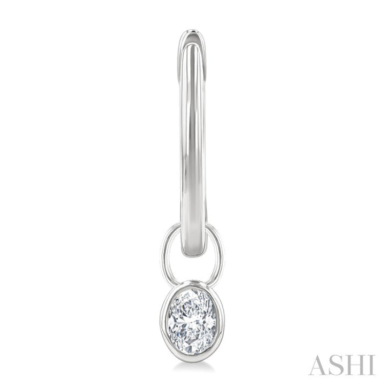 1/3 Ctw Bezel Set Oval Cut Diamond Huggie Earrings in 14K White Gold